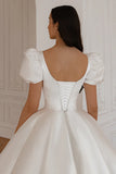 satin-long-train-wedding-gown-with-puff-sleeves-2