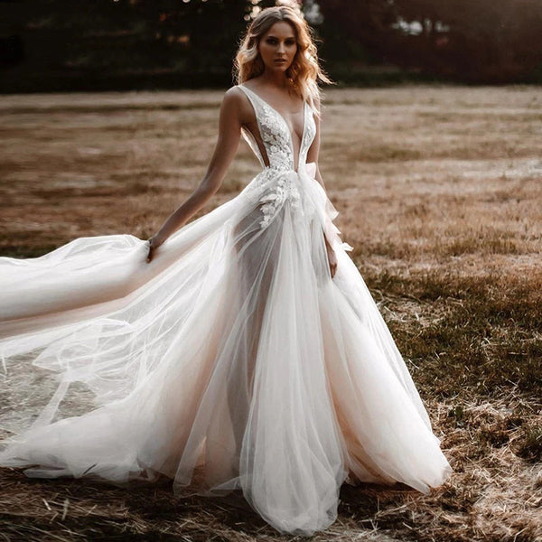 a-line-tulle-bridal-gowns-with-deep-v-neckline-4