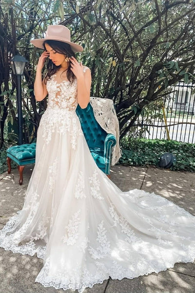 appliques-sleeveless-bridal-gown-with-transparent-neckine