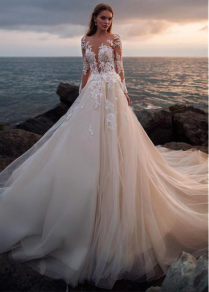 http://www.loveangeldress.com/cdn/shop/products/champagne-tulle-wedding-dress-with-illusion-lace-long-sleeves_grande.jpg?v=1571869727