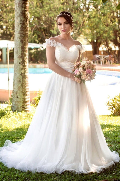 ivory-tulle-wedding-gown-with-ruffles-illusion-neckline