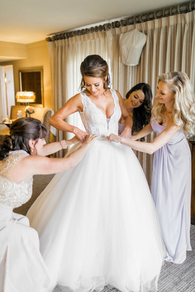 plunging-v-neckline-lace-wedding-dress-with-detachable-overskirt