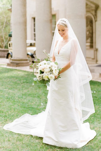 sheer-v-neckline-satin-sheath-wedding-gown-with-ruffles-back