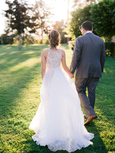 Sleeveless High Neck Lace Wedding Gown 2022