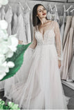 sparkling-beaded-wedding-dress-with-sheer-long-sleeves