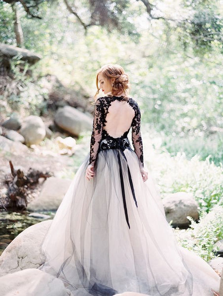 http://www.loveangeldress.com/cdn/shop/products/stylish-lace-appliqued-tulle-black-wedding-gown-with-sleeves-1_grande.jpg?v=1571869680