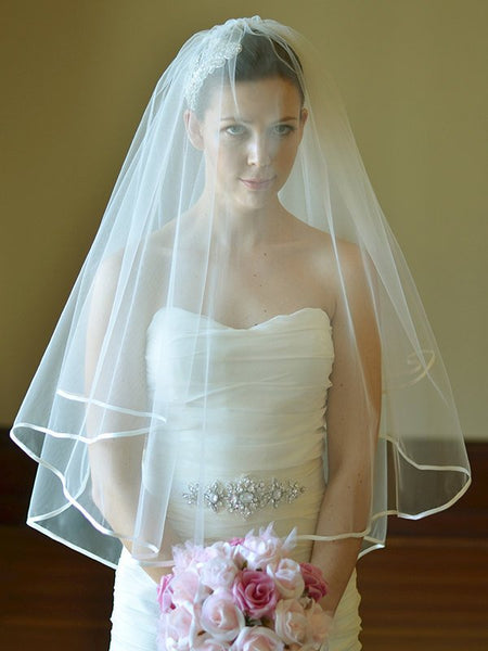 http://www.loveangeldress.com/cdn/shop/products/two-tier-ribbon-satin-edge-wedding-veil-with-blusher-2_grande.jpg?v=1571869705