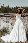 a-line-spaghetti-straps-wedding-gown-with-pockets