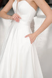 minimalist-a-line-wedding-gown-with-midi-length-skirt-3