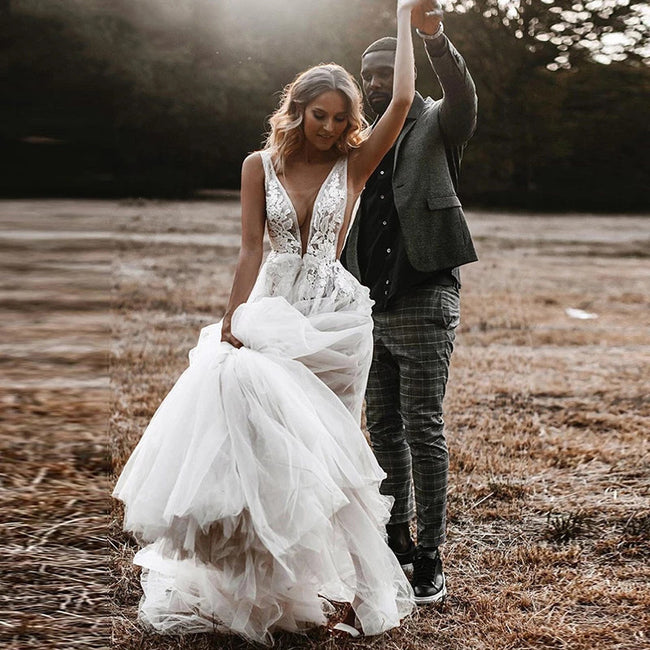    a-line-tulle-bridal-gowns-with-deep-v-neckline-1