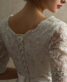 bead-lace-modest-wedding-dress-with-ruffled-organza-skirt