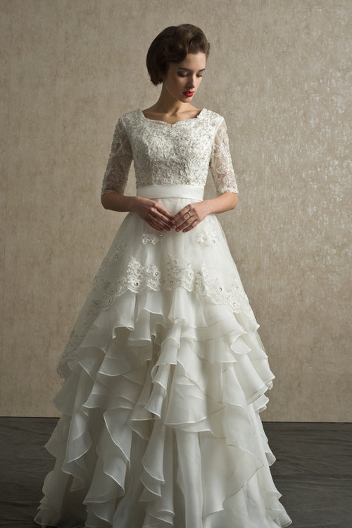 bead-lace-modest-wedding-dress-with-ruffled-organza-skirt