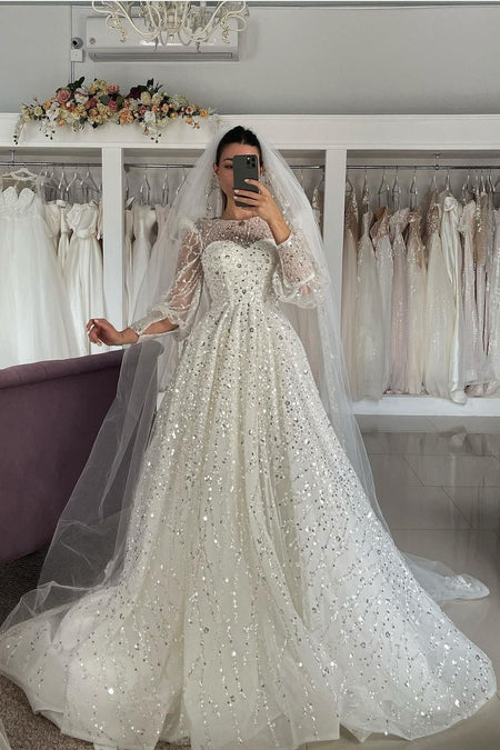 beaded and sequin wedding dress long sleeves 450x.jpg v 1661934271