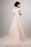 blush-pink-tulle-wedding-dress-with-lace-sleeves-1