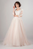 blush-pink-tulle-wedding-dress-with-lace-sleeves