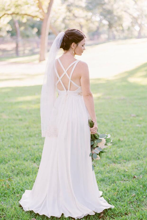 bold-v-neck-floor-length-destination-bridal-dress-wedding-crisscross-back