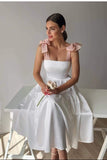 casual-short-white-wedding-dress-with-pink-bow-straps