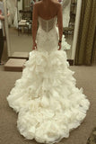 curve-hugging-beaded-wedding-dresses-with-ruffled-textured-skirt-1