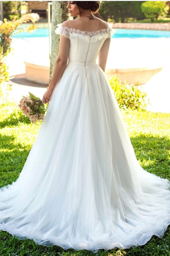 ivory-tulle-wedding-gown-with-ruffles-illusion-neckline-1