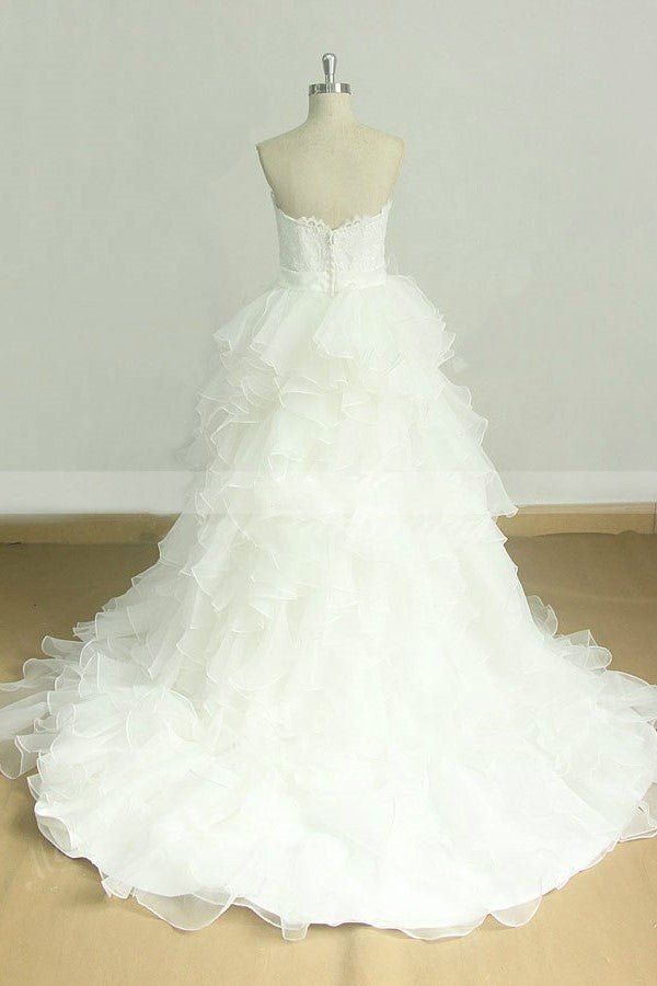 lace-strapless-wedding-gown-with-ruffled-organza-skirt-1