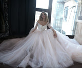 lace-tulle-blush-pink-wedding-dresses-with-off-the-shoulder-long-sleeves-2