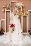    layered-tulle-blush-wedding-gown-2022-1