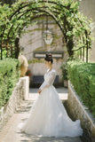 modest-lace-v-neck-outdoor-wedding-dress-with-long-sleeves-2