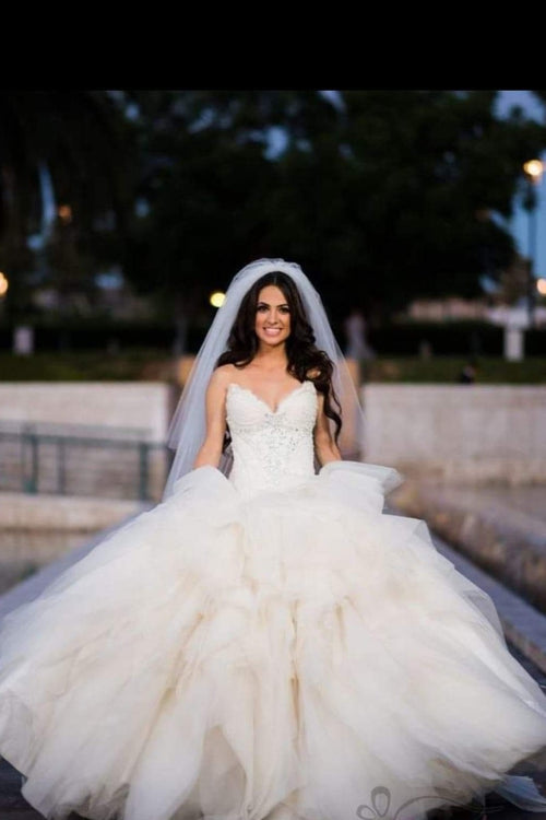 plunging-sweetheart-ball-gown-wedding-dress-with-puffy-skirt