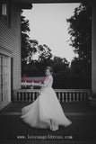 Plunging V-neck A-line Tulle Crystals Bridal Gown