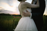 Plunging V-neck A-line Tulle Crystals Bridal Gown