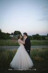Plunging V-neck A-line Tulle Crystals Bridal Gown