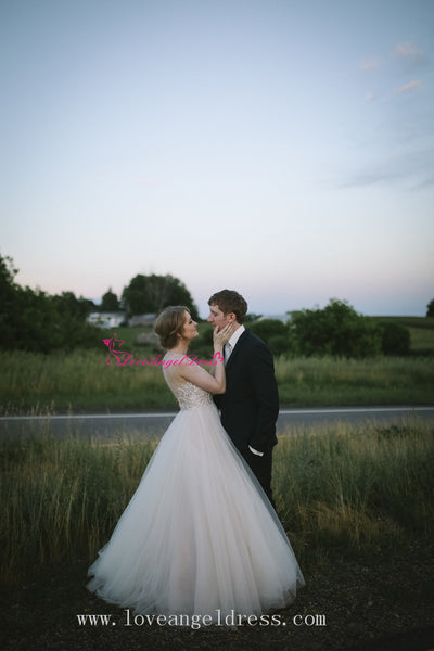 Plunging V-neck A-line Tulle Crystals Bridal Gown