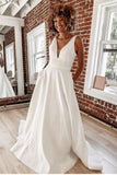 plunging-v-neck-satin-bridal-gown-with-pockets