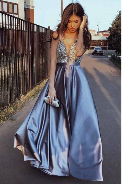 plunging-v-neckline-rhinestones-prom-dresses-with-satin-skirt