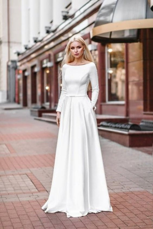 relaxed-a-line-satin-long-sleeved-wedding-dress-with-pockets