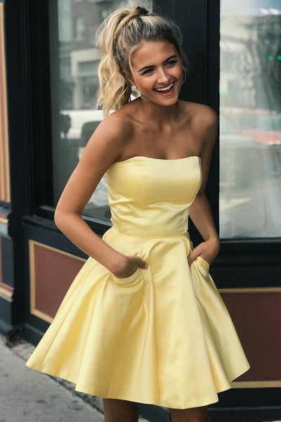 satin-light-yellow-homecoming-gown-with-pockets