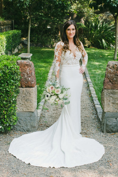 sheer-lace-long-sleeve-wedding-dress-with-simple-skirt