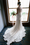 sheer-lace-mermaid-wedding-dress-with-v-back