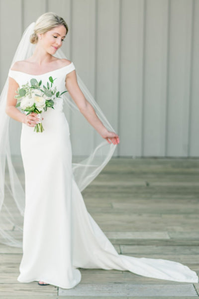simple-off-the-shoulder-wedding-dress-with-slight-train