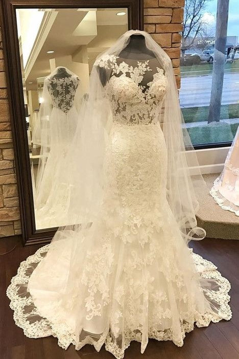 sleeveless-fit&flare-wedding-gowns-lace-sheer-neckline