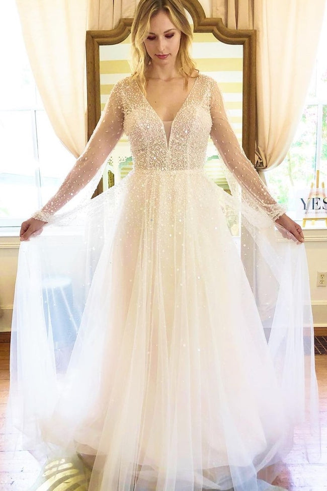 sparkling-beaded-wedding-dress-with-sheer-long-sleeves-1