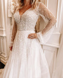 sparkling-beaded-wedding-dress-with-sheer-long-sleeves-2