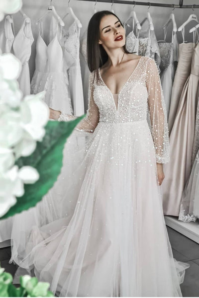 sparkling-beaded-wedding-dress-with-sheer-long-sleeves