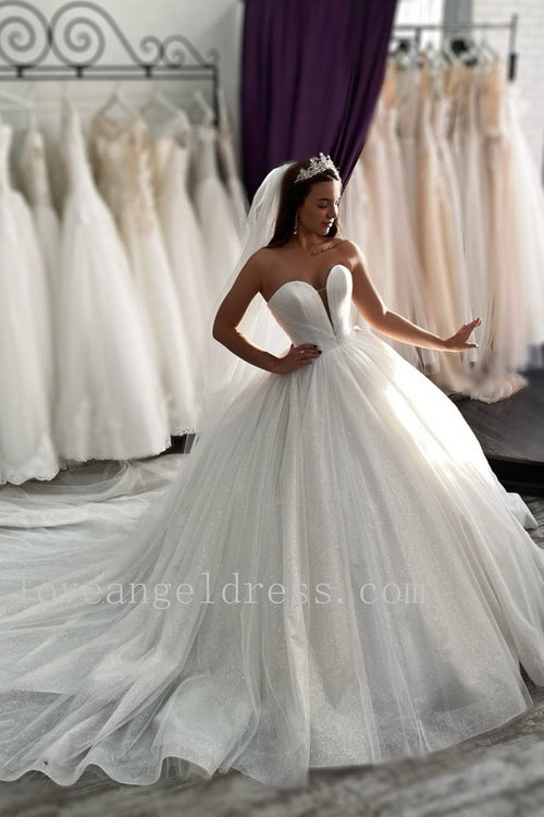 sparkling-sequin-tulle-wedding-gown-with-plunging-neckline