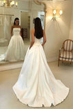 strapless-open-back-satin-wedding-gown-with-pockets-1