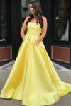 strapless-satin-yellow-prom-dresses-with-rhinestones-pockets