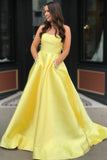 strapless-satin-yellow-prom-dresses-with-rhinestones-pockets