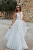 transparent-plunging-white-tulle-wedding-dress-beach-1