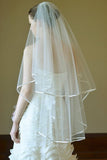 two-tier-ribbon-satin-edge-wedding-veil-with-blusher