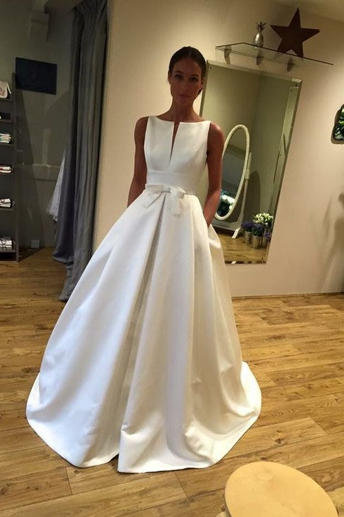 unique-neckline-satin-wedding-gown-with-pockets